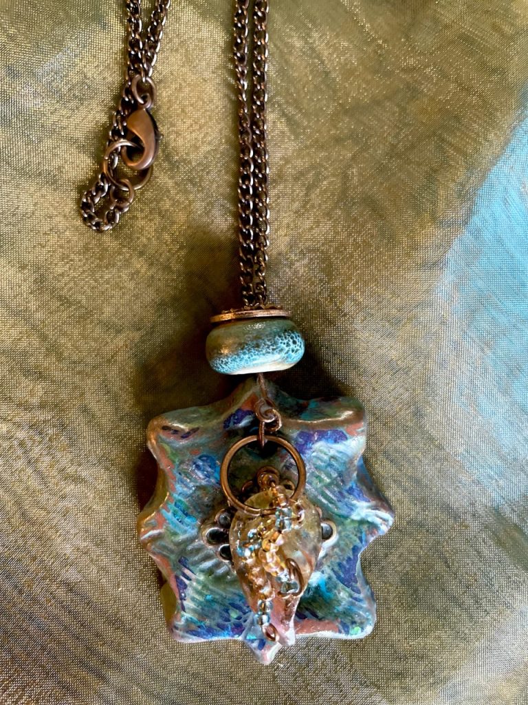 PC 58 3 cm pendant, 54 cm antique copper coloured chain $32