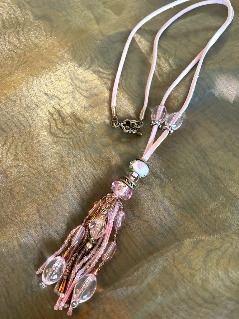 PM 79 8 cm long beaded pendant, 66 cm pink leather cord $29